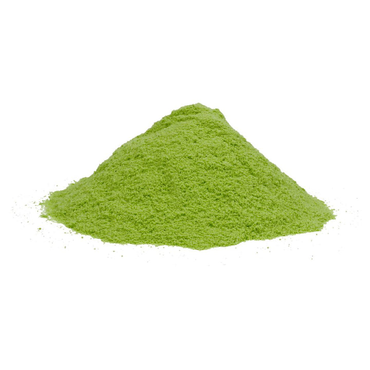 Bright green powdered matcha tea from Bulk Mushroom Powders enhances mushroom coffee benefits